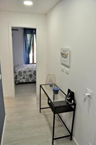 Кровать или кровати в номере Nibea Suite Apartment