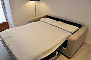 Кровать или кровати в номере Nibea Suite Apartment