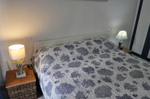 Кровать или кровати в номере Nibea Suite Apartment