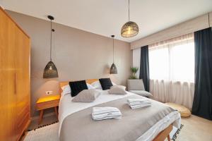 Ένα ή περισσότερα κρεβάτια σε δωμάτιο στο Boutique Rooms Luna