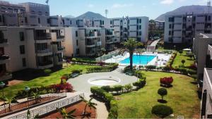 an aerial view of a courtyard with a pool and buildings at Las Viñas in Playa de las Americas