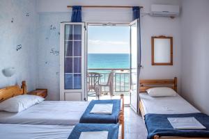 Postel nebo postele na pokoji v ubytování Madalenas B&B