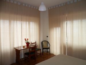 Łóżko lub łóżka w pokoju w obiekcie Hotel Panorama di Sicilia