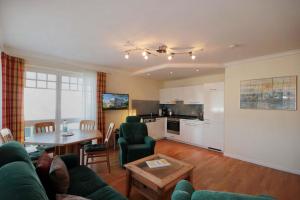 TV a/nebo společenská místnost v ubytování Villa Daphne & Danae by Rujana