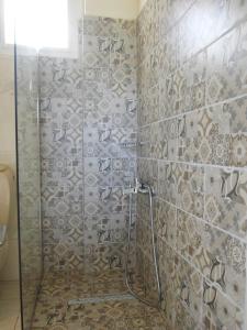 Et badeværelse på Niki Apartments + 80 billeder