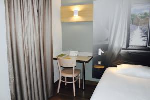 Postel nebo postele na pokoji v ubytování B&B HOTEL Valence TGV Romans