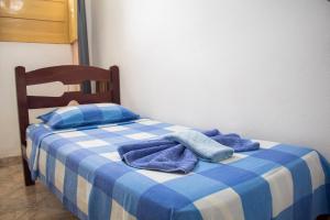 Postel nebo postele na pokoji v ubytování Pousada e Hostel Chapada Suites