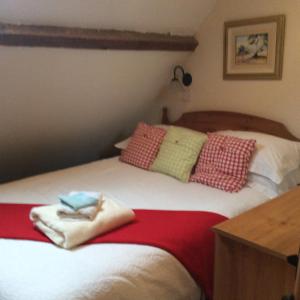 Łóżko lub łóżka w pokoju w obiekcie Ranvilles Farm House