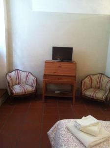 A television and/or entertainment centre at Luisa in Palazzo Bianchi