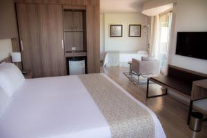 Letto o letti in una camera di 7 Saltos Resort