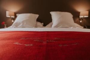 Ένα ή περισσότερα κρεβάτια σε δωμάτιο στο Hotel New Regina