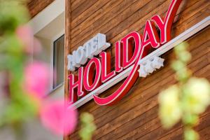Certifikát, hodnocení, plakát nebo jiný dokument vystavený v ubytování Hotel Holiday