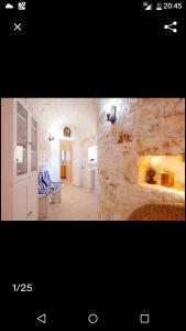 two pictures of a living room with a fireplace at Trullo saraceno in Ostuni