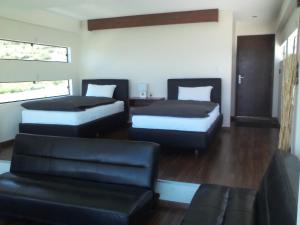 Postel nebo postele na pokoji v ubytování Hotel Onkel Inn Torres de Copacabana