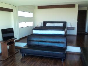 TV a/nebo společenská místnost v ubytování Hotel Onkel Inn Torres de Copacabana