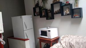 Kuchyň nebo kuchyňský kout v ubytování Hospedaje Marita