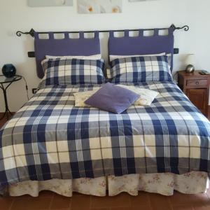Postel nebo postele na pokoji v ubytování Le Siepi