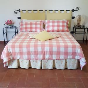 Postel nebo postele na pokoji v ubytování Le Siepi