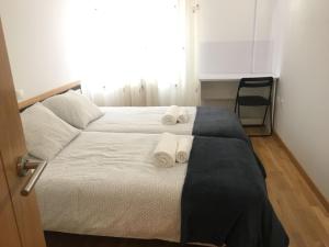 Posteľ alebo postele v izbe v ubytovaní Alojamiento moderno y céntrico