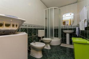 Kúpeľňa v ubytovaní Apartments Krusica
