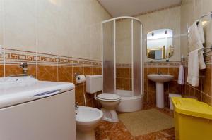 Kúpeľňa v ubytovaní Apartments Krusica