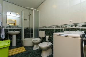 Kúpeľňa v ubytovaní Apartments Krusica