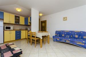 Kuchyňa alebo kuchynka v ubytovaní Apartments Krusica