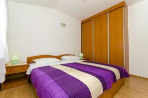 Posteľ alebo postele v izbe v ubytovaní Apartments Krusica