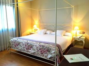 Postel nebo postele na pokoji v ubytování Hotel Villa Monter