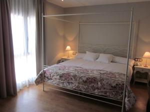 Postel nebo postele na pokoji v ubytování Hotel Villa Monter