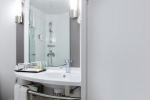 Baðherbergi á Ibis Ambassador Myeongdong