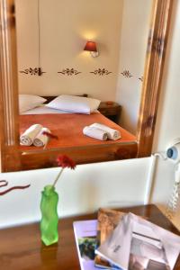 Postel nebo postele na pokoji v ubytování Guesthouse Corali
