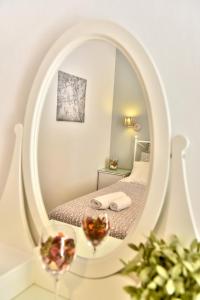 Postel nebo postele na pokoji v ubytování Guesthouse Corali