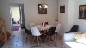 a dining room with a table and chairs at Ferienhaus Scharl in Schruns