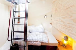Ein Bett oder Betten in einem Zimmer der Unterkunft Klabauterbett