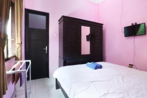 TV a/nebo společenská místnost v ubytování Anantaya Home Denpasar