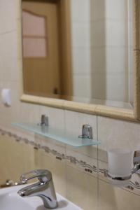 Kúpeľňa v ubytovaní Apartament na Wydmie Ustka