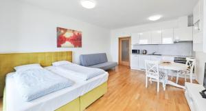 Kuchyňa alebo kuchynka v ubytovaní Garden Towers Apartments