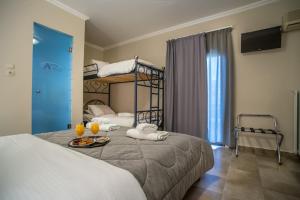 Postel nebo postele na pokoji v ubytování Anita Hotel