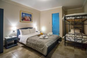 Postel nebo postele na pokoji v ubytování Anita Hotel