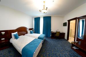 Cama o camas de una habitación en Hotel Diesel