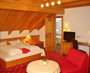Postel nebo postele na pokoji v ubytování Hotel Schwarzenbergs Traube