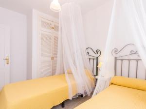 Postel nebo postele na pokoji v ubytování Chalet Sancti Petri