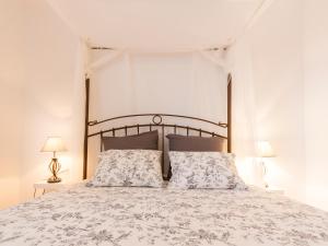 Postel nebo postele na pokoji v ubytování Chalet Sancti Petri