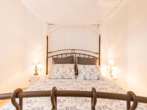 Postel nebo postele na pokoji v ubytování Chalet Sancti Petri + 22 fotografií