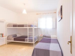 Postel nebo postele na pokoji v ubytování Chalet Sancti Petri