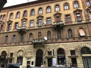 a large brick building with windows and balconies at Danube Panorama Apartments in Budapest