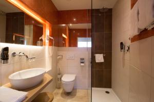 Koupelna v ubytování Hotel Munde
