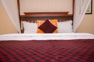 Ein Bett oder Betten in einem Zimmer der Unterkunft Hotel Rudi