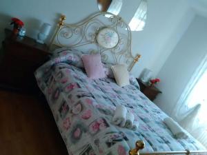 Postel nebo postele na pokoji v ubytování B&B Tisoi